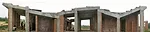 An angled concrete roof collects and stores rainwater and provides a place to dry food.