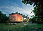 The screened porch faces Long Island Sound to the north. 