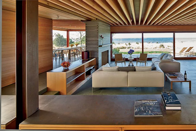 The sunken living room allows views from the kitchen.