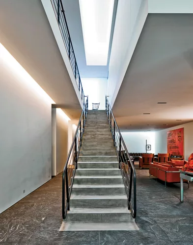 A skylight illuminates the stair to the second floor.