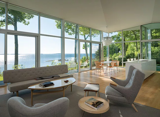 The architect's choice of Scandinavian furnishings appealed to the client and the new owners.