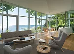 The architect's choice of Scandinavian furnishings appealed to the client and the new owners.