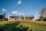 The living spaces on the main level look toward the polders. 