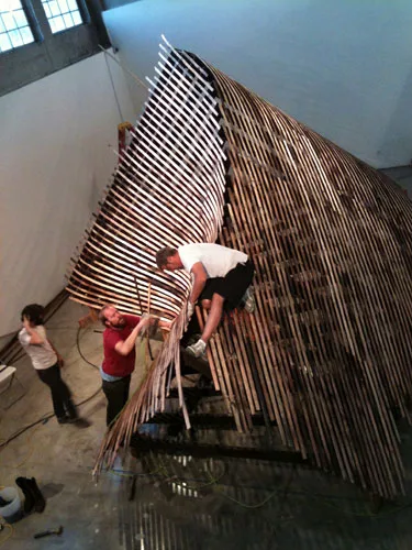 Justin Rice (left) and Kagan Taylor (center) from the Knowhow Shop worked with architect Jason Payne, principal of Hirsuta, on 'Rawhide, or, the New Shingle Style' an exhibition that ran at the SCI-Ar