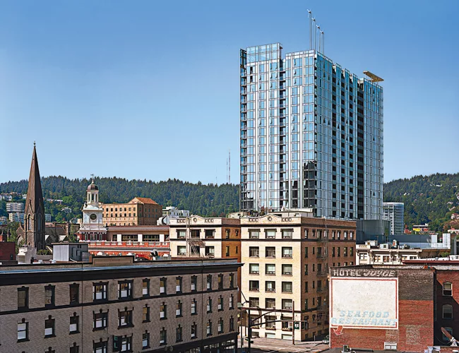 By combining CFD analyses and wind-tunnel tests, designers from ZGF determined the optimal configuration for turbines to be mounted on the roof of this mixed-use high-rise.