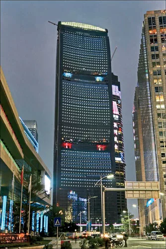 The envelope of SOM&rsquo;s 1,014-foot-tall tower in Guangzhou, China, includes ducts shaped to accelerate prevailing winds. Exterior lighting acts as a real-time indicator of wind-power output.