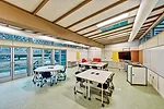 Marker boards replace drywall on the interior and&mdash;allowing teachers to bring the classroom outside&mdash;some of the exterior cladding panels.