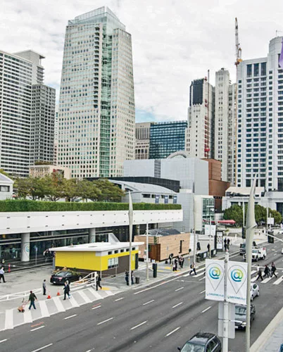 A SAGE classroom clad in mostly yellow fiber-cement board was erected in front of San Francisco&rsquo;s Moscone Center during the Greenbuild conference in late 2012.