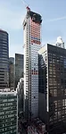 The slender tower designed by Rafael Vi'oly, currently under construction, will ultimately be almost 1,400 feet tall.