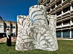 The pavilion is 9 feet tall and has a footprint of 144 square feet.