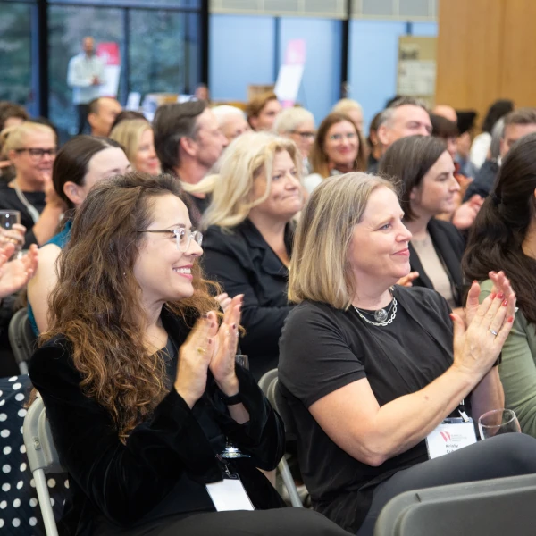 attendees watching the Women in Architecture award ceremony