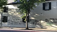Decatur House Historic Decatur House with graffiti reading: Why do we have to keep telling you black lives matter?