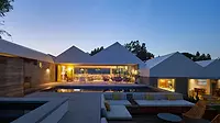 Hillstop-Residence-Featured-House-4.jpg House Stepping Down a Hill by Bestor Architecture, exterior at sumset
