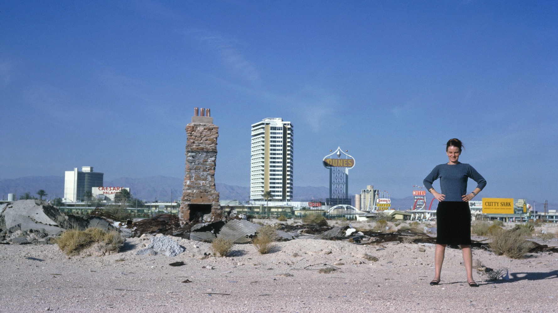 archival photo of denise scott brown with las vegas in the background