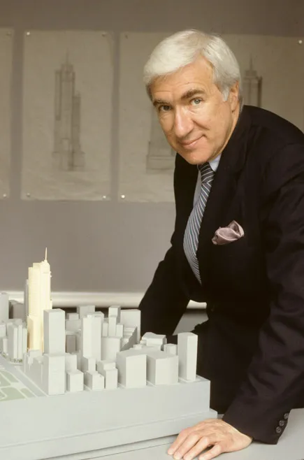 Gene Kohn with architectural model in his office.