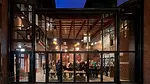 exterior view of a glass-walled social space 