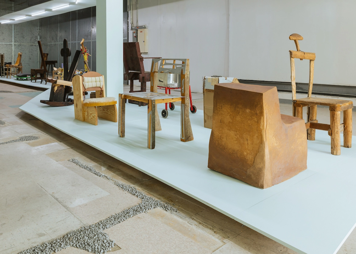 Ad-hoc chairs on display in an exhibition.