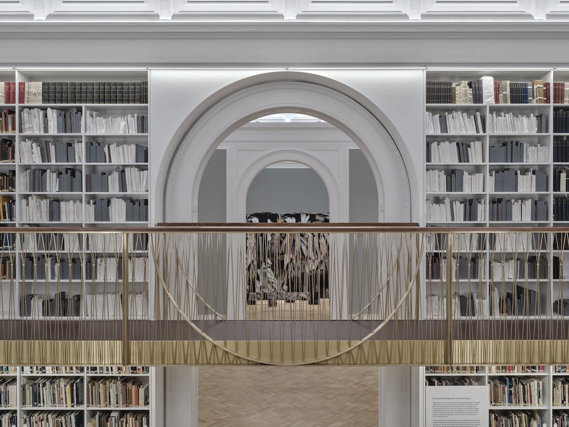 a museum library space with a mezzanine.