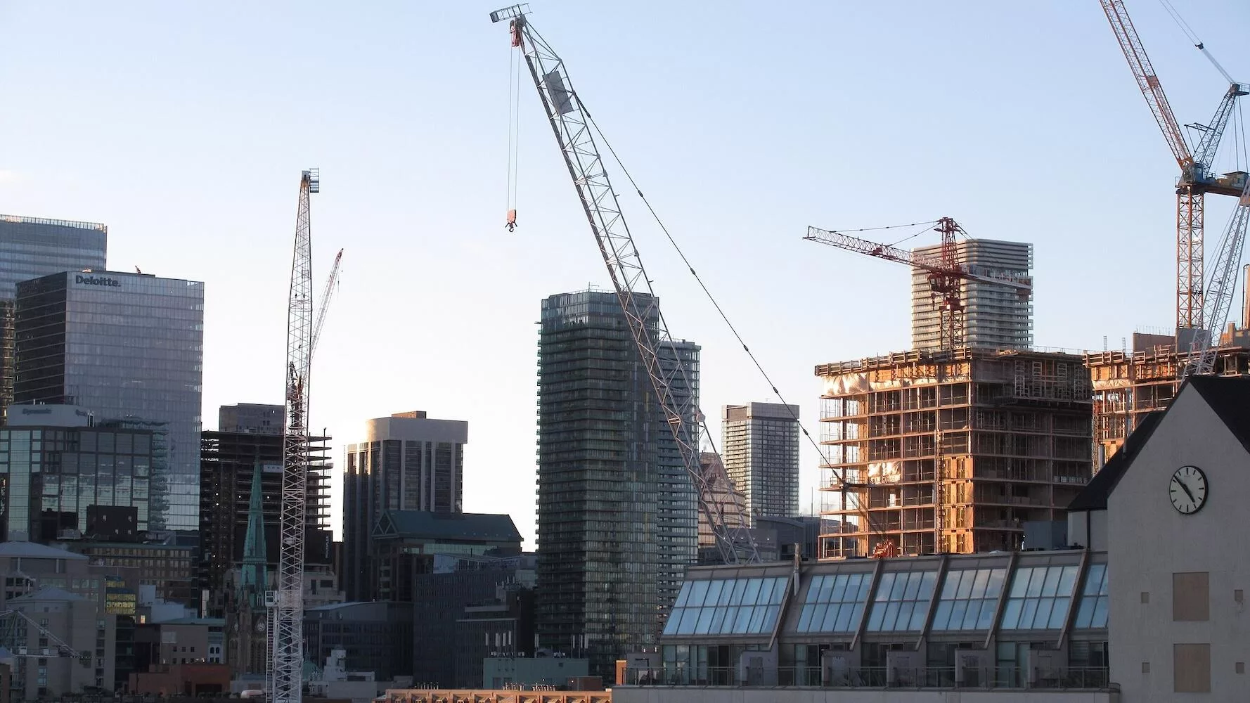 Construction cranes on toronto skyline