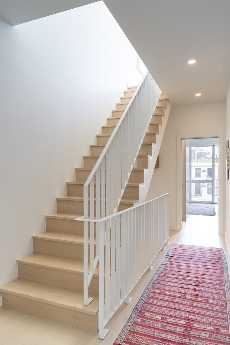 Image of staiorcase within Gowanus townhouse.