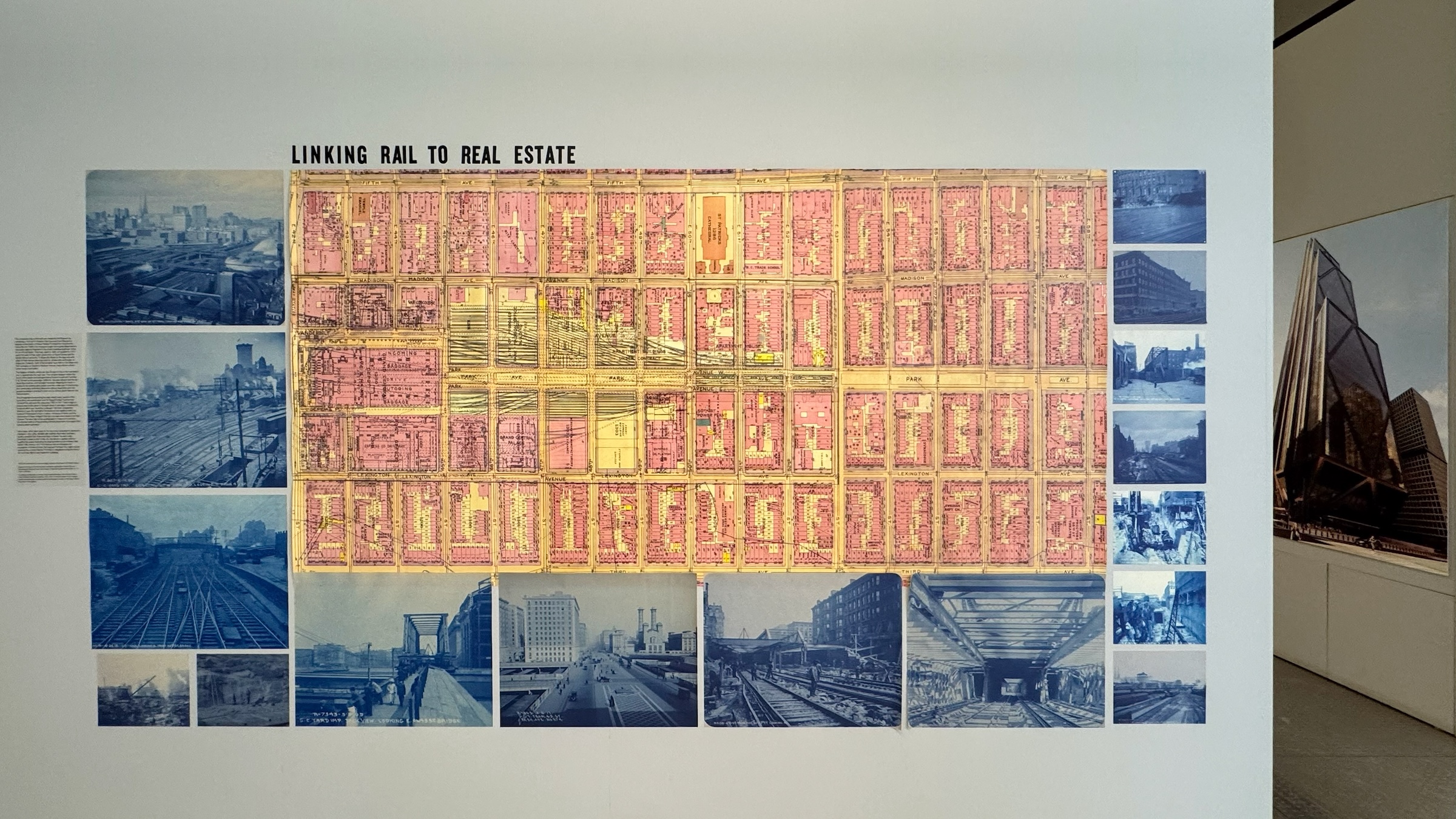 Exhibition wall with map and cyanotypes