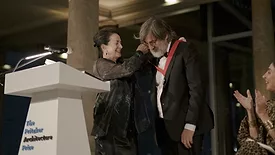 Smiljan Radić Clarke receives his Pritzker medal from Margot Pritzker.