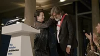 Smiljan Radić Clarke receives his Pritzker medal from Margot Pritzker.