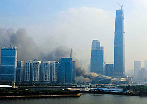 A fire has charred part of an opera house designed by Zaha Hadid currently under construction in Guangzhou, China.