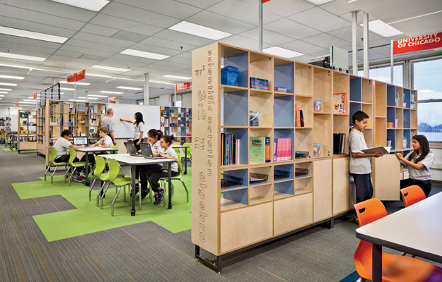 At the William P. Gray School in Chicago, the first school to implement the Learning Module furniture system, the units feature a combination of open storage cubbies, cabinet doors, sliding whiteboards, and power/ data poles, and partitions off the various learning zones.